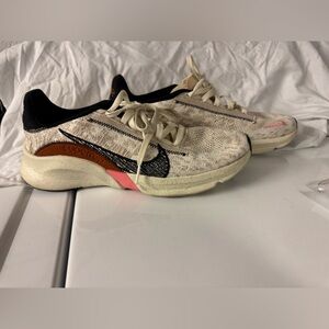 Nike Cream and Black Sneakers with Sleek Design